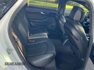 2017 Audi A8 Sport z VIN WAU43AFD7HN005619, wystawiony jako Copart lot #57526015 z przebiegiem 57 262 mil mil oraz Szkoda całkowita • Salvage title. Historia ofert i sprzedaży dostępna na DreamBid. Obrazek 6.