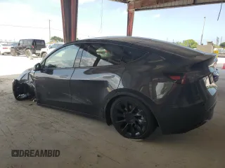 2024 Tesla Model Y с VIN 7SAYGDED3RF044335, выставлен на аукционе Copart как лот 58263265 с пробегом Не указан миль и Списание • Salvage title. История ставок и продаж доступна на DreamBid. Изображение 2.