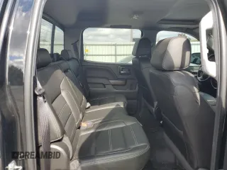 2018 GMC Sierra 1500 Denali z VIN 3GTU2PEJ3JG523077, wystawiony jako Copart lot #72094704 z przebiegiem 117 756 mil mil oraz Szkoda całkowita • Salvage title. Historia ofert i sprzedaży dostępna na DreamBid. Obrazek 10.