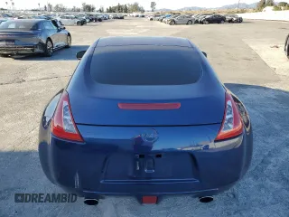 2017 Nissan 370Z z VIN JN1AZ4EH6HM952086, wystawiony jako Copart lot #88158105 z przebiegiem Nie podano mil oraz Szkoda całkowita • Salvage title. Historia ofert i sprzedaży dostępna na DreamBid. Obrazek 6.
