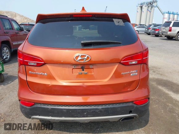 2014 Hyundai Santa Fe z VIN 5XYZTDLB0EG208769, wystawiony jako IAAI lot #42485411 z przebiegiem 82 173 mil mil oraz . Historia ofert i sprzedaży dostępna na DreamBid. Obrazek 16.