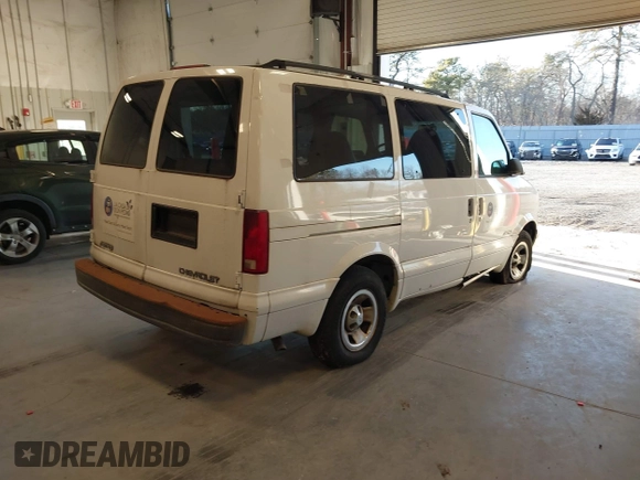 2002 Chevrolet Astro with VIN 1GNDM19X32B146063, listed as a IAAI auction lot 41595819 with 77,364 mi miles. Bid and sale history available at carsss.com. Image 4.
