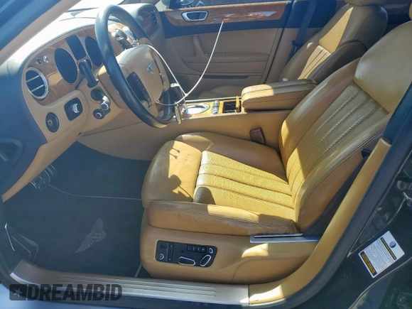 2007 Bentley Flying Spur with VIN SCBBR93WX78043729, listed as a Copart auction lot 49289635 with 66,295 mi miles and Clean Title. Bid and sale history available at DreamBid. Image 7.
