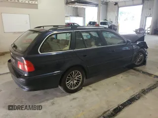 2001 BMW 5 Series 525i with VIN WBADS43421GD84986, listed as a Copart auction lot 64464735 with Not provided miles and Salvage title. Bid and sale history available at DreamBid. Image 3.