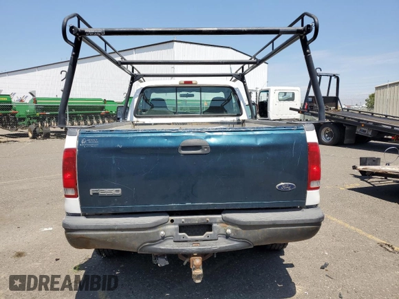 1999 Ford F-250 XL with VIN 1FTNF21L2XEE17853, listed as a Copart auction lot 58869285 with 140,220 mi miles and Clean title. Bid and sale history available at DreamBid. Image 6.