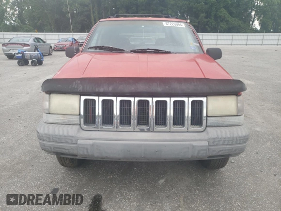 1998 Jeep Grand Cherokee Laredo with VIN 1J4FX58S3WC144684, listed as a Copart auction lot 67226694 with 106,602 mi miles and Clean Title. Bid and sale history available at carsss.com. Image 5.