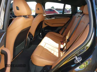 2020 BMW X4 xDrive30i z VIN 5UX2V1C05L9C41372, wystawiony jako IAAI lot #42316997 z przebiegiem 73 412 mil mil oraz . Historia ofert i sprzedaży dostępna na DreamBid. Obrazek 8.