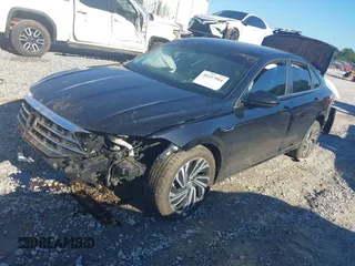2020 Volkswagen Jetta SEL z VIN 3VWE57BU2LM093697, wystawiony jako IAAI lot #40437984 z przebiegiem 76 803 mil mil oraz . Historia ofert i sprzedaży dostępna na DreamBid. Obrazek 18.