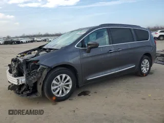 2017 Chrysler Pacifica Touring L with VIN 2C4RC1BG4HR593152, listed as a Copart auction lot 87869615 with 83,292 mi miles and Salvage Title. Bid and sale history available at DreamBid. Image 1.