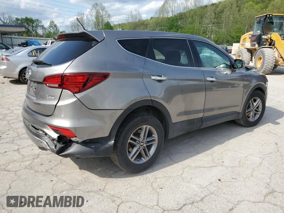 2018 Hyundai Santa Fe 2.4L z VIN 5NMZTDLB9JH079656, wystawiony jako Copart lot #54256175 z przebiegiem 100 678 mil mil oraz Szkoda całkowita • Salvage title. Historia ofert i sprzedaży dostępna na DreamBid. Obrazek 3.