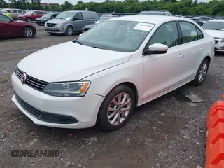 2014 Volkswagen Jetta SE with VIN 3VWD07AJ2EM239987, listed as a IAAI auction lot 42555560 with 115,987 mi miles and . Bid and sale history available at DreamBid. Image 2.