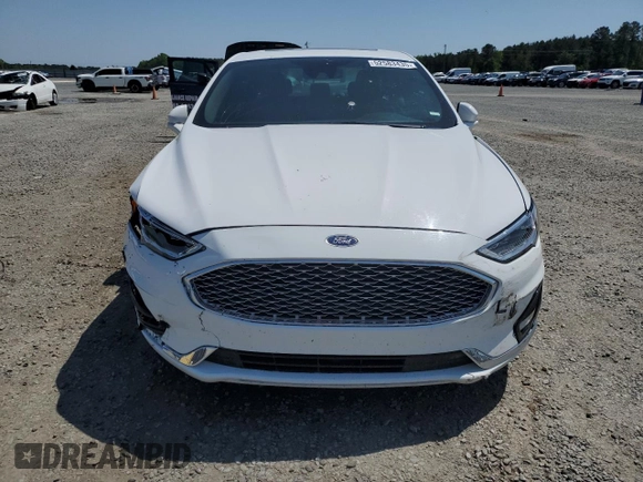 2020 Ford Fusion Titanium с VIN 3FA6P0K99LR174094, выставлен на аукционе Copart как лот 52583435 с пробегом 98 389 миль миль и Списание • Salvage title. История ставок и продаж доступна на DreamBid. Изображение 5.