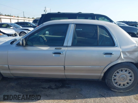 2004 Mercury Grand Marquis GS with VIN 2MEFM74W34X677247, listed as a IAAI auction lot 41856970 with 135,225 mi miles and . Bid and sale history available at DreamBid. Image 13.