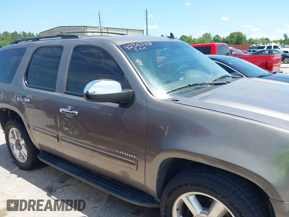 2011 Chevrolet Tahoe LS with VIN 1GNSCAE00BR343816, listed as a IAAI auction lot 42363718 with 253,212 mi miles and . Bid and sale history available at DreamBid. Image 13.