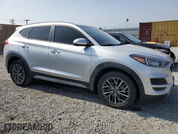 2019 Hyundai Tucson SEL with VIN KM8J33AL7KU841214, listed as a Copart auction lot 59331185 with 99,150 mi miles and Salvage title. Bid and sale history available at DreamBid. Image 4.