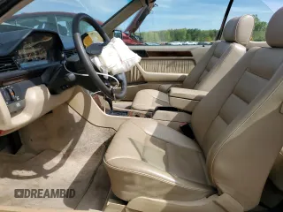 1995 Mercedes-Benz E Class with VIN WDBEA66EXSC176515, listed as a Copart auction lot 71495944 with 141,036 mi miles and Salvage Title. Bid and sale history available at carsss.com. Image 7.