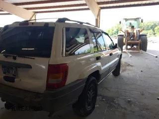 2000 Jeep Grand Cherokee Laredo with VIN 1J4G248S7YC363891, listed as a IAAI auction lot 42715393 with 238,686 mi miles and . Bid and sale history available at DreamBid. Image 4.
