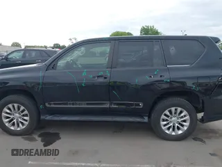 2014 Lexus GX with VIN JTJBM7FX0E5069997, listed as a IAAI auction lot 42076860 with 122,800 mi miles. Bid and sale history available at carsss.com. Image 15.