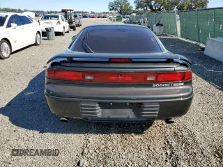 1992 Mitsubishi 3000GT z VIN JA3XE74CXNY052868, wystawiony jako Copart lot #81620654 z przebiegiem 124 361 mil mil oraz Szkody całkowita. Historia ofert i sprzedaży dostępna na DreamBid. Obrazek 6.