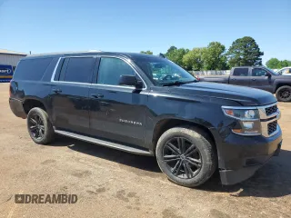 2019 Chevrolet Suburban LS with VIN 1GNSCGECXKR208615, listed as a Copart auction lot 52187105 with 174,105 mi miles and Salvage title. Bid and sale history available at DreamBid. Image 4.