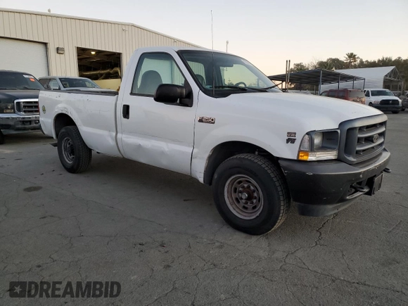 2002 Ford Super Duty F-250 XL with VIN 1FTNF20L32EA82290, listed as a Copart auction lot 82052494 with 133,019 mi miles and Clean Title. Bid and sale history available at carsss.com. Image 4.