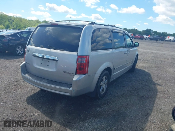 2009 Dodge Grand Caravan SXT z VIN 2D8HN541X9R663021, wystawiony jako IAAI lot #42202983 z przebiegiem 255 173 mil mil oraz . Historia ofert i sprzedaży dostępna na DreamBid. Obrazek 4.