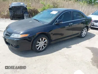2006 Acura TSX with VIN JH4CL96866C024685, listed as a IAAI auction lot 42143321 with 230,703 mi miles. Bid and sale history available at carsss.com. Image 2.