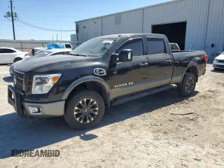 2017 Nissan Titan XD PRO-4X with VIN 1N6BA1F45HN548187, listed as a Copart auction lot 48001045 with 104,979 mi miles and Clean Title. Bid and sale history available at carsss.com. Image 1.