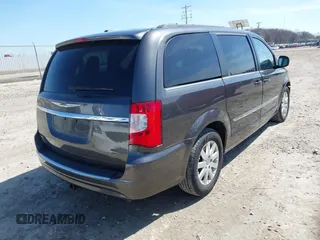 2015 Chrysler Town & Country Touring with VIN 2C4RC1BG9FR538421, listed as a IAAI auction lot 42055002 with 152,804 mi miles. Bid and sale history available at carsss.com. Image 4.
