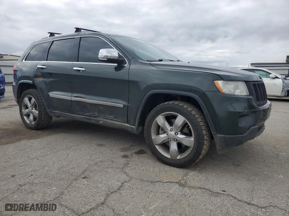 2011 Jeep Grand Cherokee Overland with VIN 1J4RR6GT4BC713527, listed as a Copart auction lot 49399445 with 145,242 mi miles and Salvage Title. Bid and sale history available at carsss.com. Image 4.