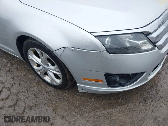 2012 Ford Fusion SE with VIN 3FAHP0HA9CR164546, listed as a IAAI auction lot 42016566 with 185,251 mi miles. Bid and sale history available at carsss.com. Image 12.