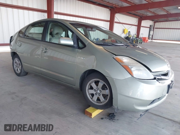 2007 Toyota Prius with VIN JTDKB20U873292426, listed as a IAAI auction lot 41239616 with 310,929 mi miles. Bid and sale history available at carsss.com. Image 1.