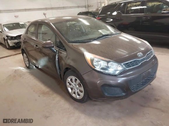 2013 Kia Rio SX with VIN KNADN5A32D6136879, listed as a IAAI auction lot 41815817 with 110,763 mi miles. Bid and sale history available at carsss.com. Image 1.