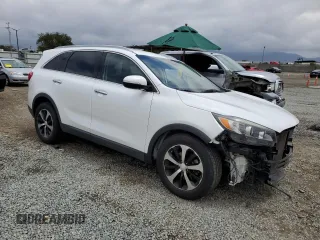 2017 Kia Sorento EX z VIN 5XYPH4A57HG301802, wystawiony jako Copart lot #55183885 z przebiegiem 128 064 mil mil oraz Szkoda całkowita • Salvage title. Historia ofert i sprzedaży dostępna na DreamBid. Obrazek 4.