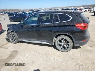 2018 BMW X1 sDrive28i with VIN WBXHU7C31J5H39068, listed as a Copart auction lot 49018985 with 100,611 mi miles and Salvage Title. Bid and sale history available at carsss.com. Image 2.