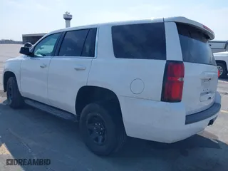 2020 Chevrolet Tahoe Commercial with VIN 1GNSKDEC5LR261015, listed as a IAAI auction lot 42001083 with 110,668 mi miles. Bid and sale history available at carsss.com. Image 3.