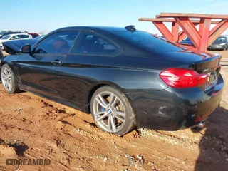 2014 BMW 4 Series 435i xDrive with VIN WBA3R5C5XEK186453, listed as a IAAI auction lot 41417704 with 150,533 mi miles. Bid and sale history available at carsss.com. Image 3.