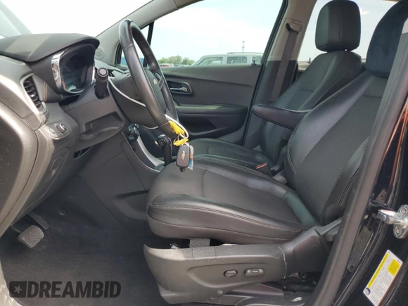 2021 Chevrolet Trax LT z VIN KL7CJLSB8MB356150, wystawiony jako Copart lot #52855555 z przebiegiem 51 781 mil mil oraz Szkoda całkowita • Salvage title. Historia ofert i sprzedaży dostępna na DreamBid. Obrazek 7.