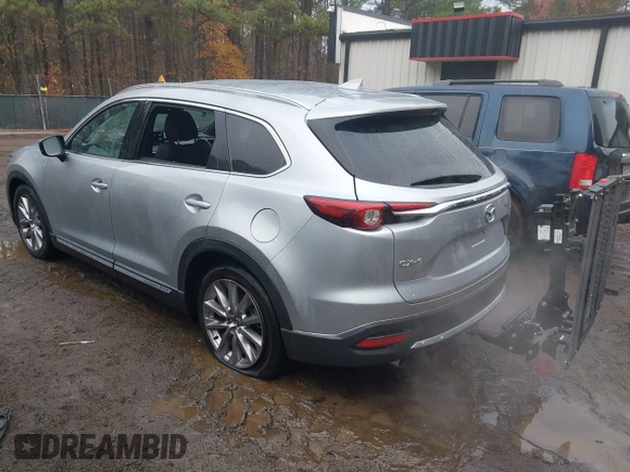 2020 Mazda CX-9 Grand Touring with VIN JM3TCADY4L0405509, listed as a IAAI auction lot 41124952 with 81,786 mi miles. Bid and sale history available at carsss.com. Image 3.