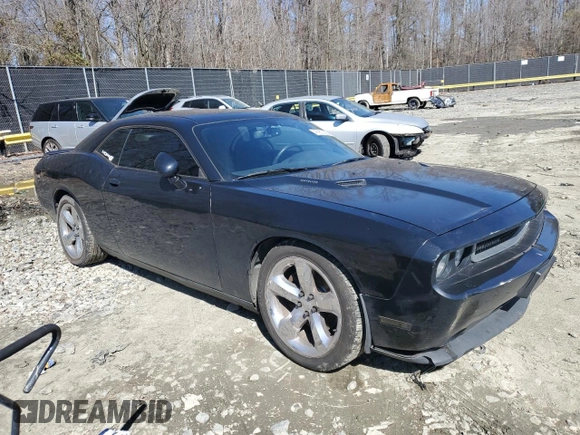 2014 Dodge Challenger R/T Plus z VIN 2C3CDYBT5EH108936, wystawiony jako Copart lot #46652305 z przebiegiem 229 673 mil mil oraz Szkoda całkowita • Salvage title. Historia ofert i sprzedaży dostępna na DreamBid. Obrazek 4.