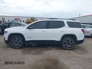 2021 GMC Acadia SLT with VIN 1GKKNMLS3MZ176996, listed as a IAAI auction lot 42475945 with 82,571 mi miles and . Bid and sale history available at DreamBid. Image 14.