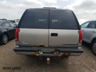 1999 Chevrolet Suburban with VIN 1GNFK16RXXJ458740, listed as a Copart auction lot 65869174 with 200,965 mi miles and Clean Title. Bid and sale history available at carsss.com. Image 6.