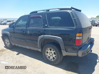 2005 Chevrolet Tahoe LT z VIN 1GNEK13T35R116833, wystawiony jako IAAI lot #42508302 z przebiegiem 254 759 mil mil oraz . Historia ofert i sprzedaży dostępna na DreamBid. Obrazek 3.