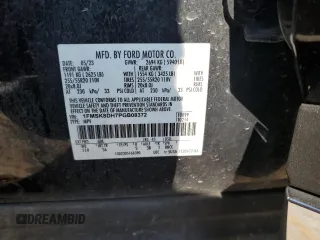 2023 Ford Explorer XLT with VIN 1FMSK8DH7PGB08372, listed as a Copart auction lot 62395205 with 63,257 mi miles and Salvage title. Bid and sale history available at DreamBid. Image 12.