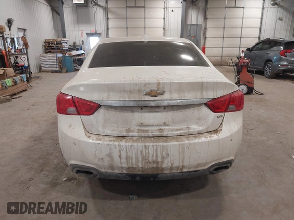 2014 Chevrolet Impala LTZ with VIN 1G1155S38EU126898, listed as a IAAI auction lot 41356611 with 196,550 mi miles and . Bid and sale history available at DreamBid. Image 16.