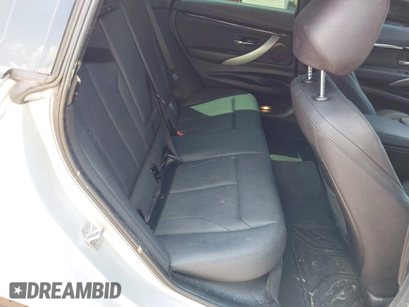2018 BMW 3 Series 330i xDrive with VIN WBA8Z9C54JG828210, listed as a IAAI auction lot 42468521 with 72,741 mi miles and . Bid and sale history available at DreamBid. Image 8.