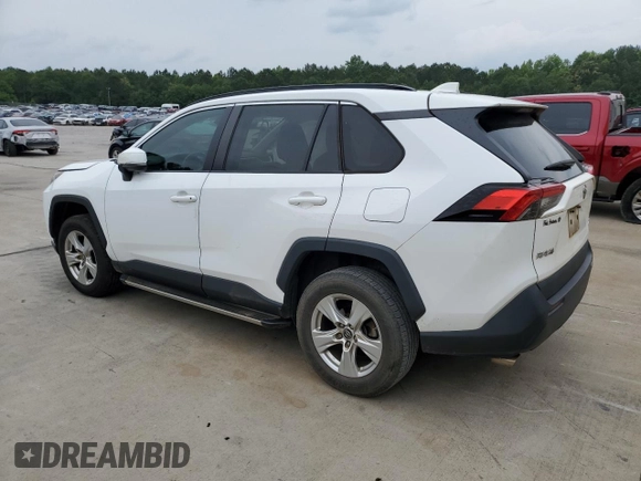 2019 Toyota RAV4 XLE with VIN 2T3P1RFV6KC060285, listed as a Copart auction lot 59195955 with 136,942 mi miles and Salvage title. Bid and sale history available at DreamBid. Image 2.
