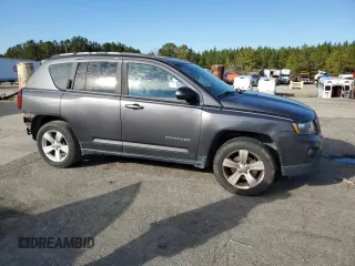 2015 Jeep Compass Latitude with VIN 1C4NJCEBXFD274712, listed as a Copart auction lot 41638375 with 142,684 mi miles and Salvage Title. Bid and sale history available at carsss.com. Image 4.