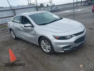 2018 Chevrolet Malibu LT z VIN 1G1ZD5STXJF115938, wystawiony jako IAAI lot #40865907 z przebiegiem 123 115 mil mil oraz . Historia ofert i sprzedaży dostępna na DreamBid. Obrazek 1.