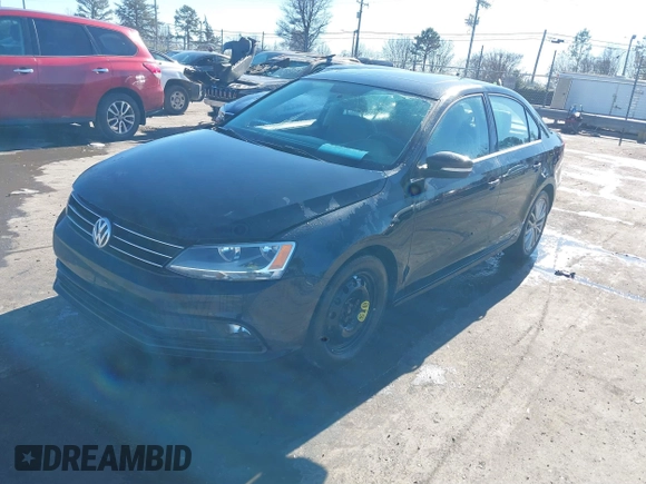 2015 Volkswagen Jetta Sedan 1.8T SE w/Connectivity with VIN 3VWD07AJ6FM303403, listed as a IAAI auction lot 41330778 with 150,949 mi miles. Bid and sale history available at carsss.com. Image 17.